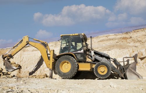 heavy-excavator-digging-day-light heavy-excavator-digging-day-light